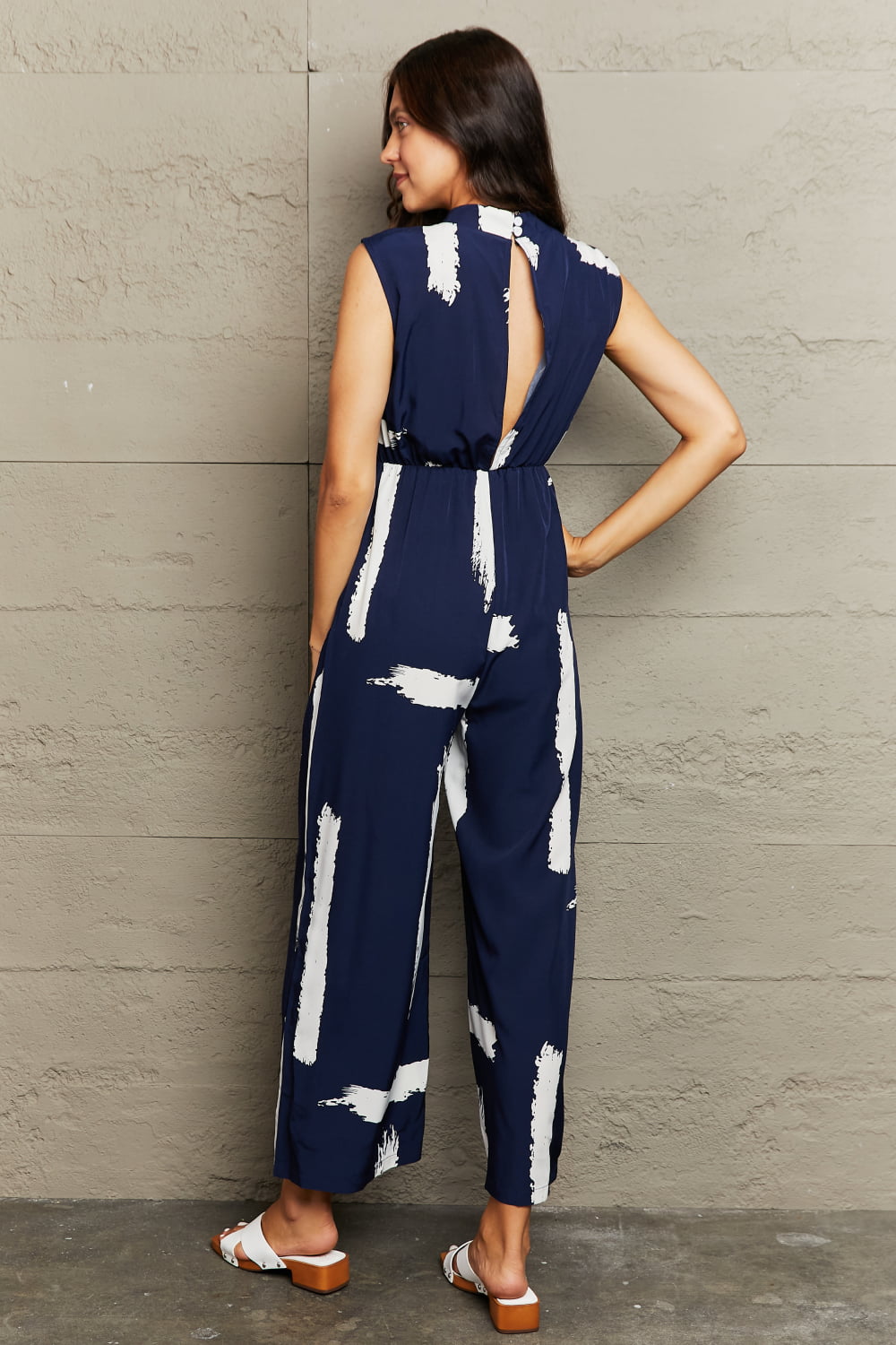 Rosy Brown Printed Round Neck Cutout Jumpsuit with Pockets Clothing