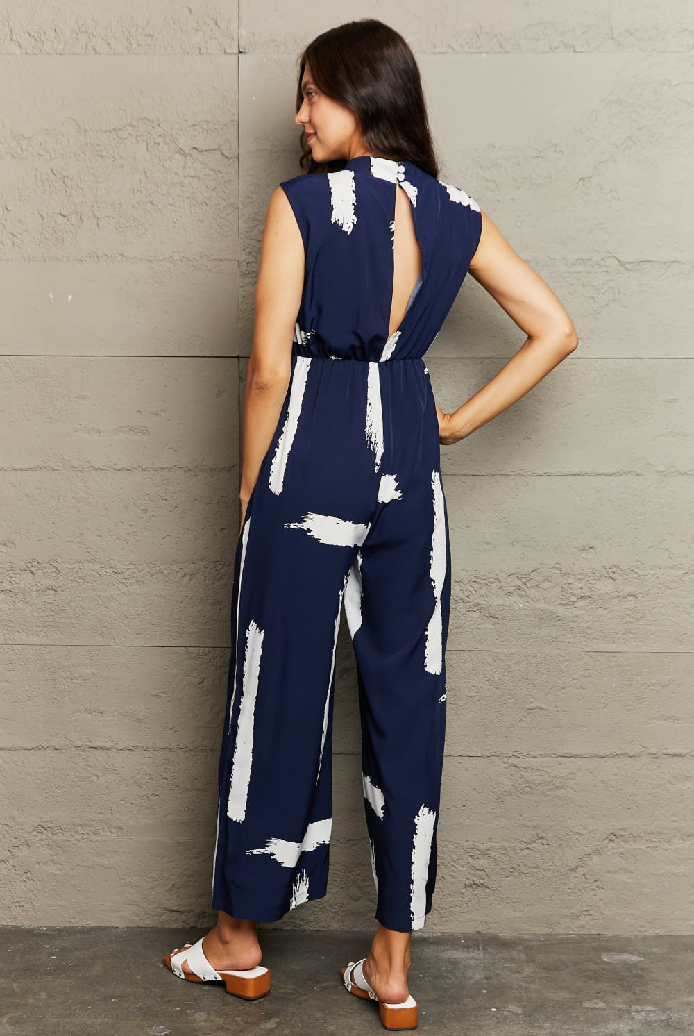 Rosy Brown Printed Round Neck Cutout Jumpsuit with Pockets Clothing